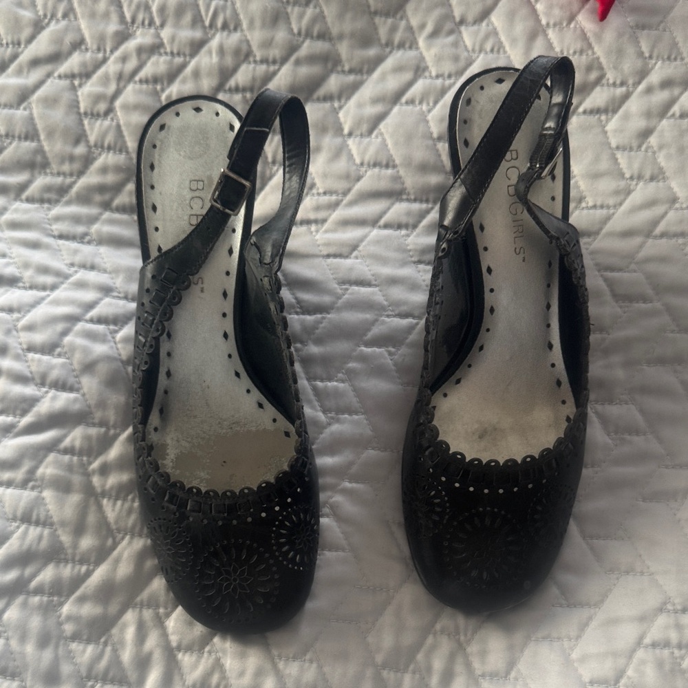 BCBGirls Black wedges for Women. Embossed leather